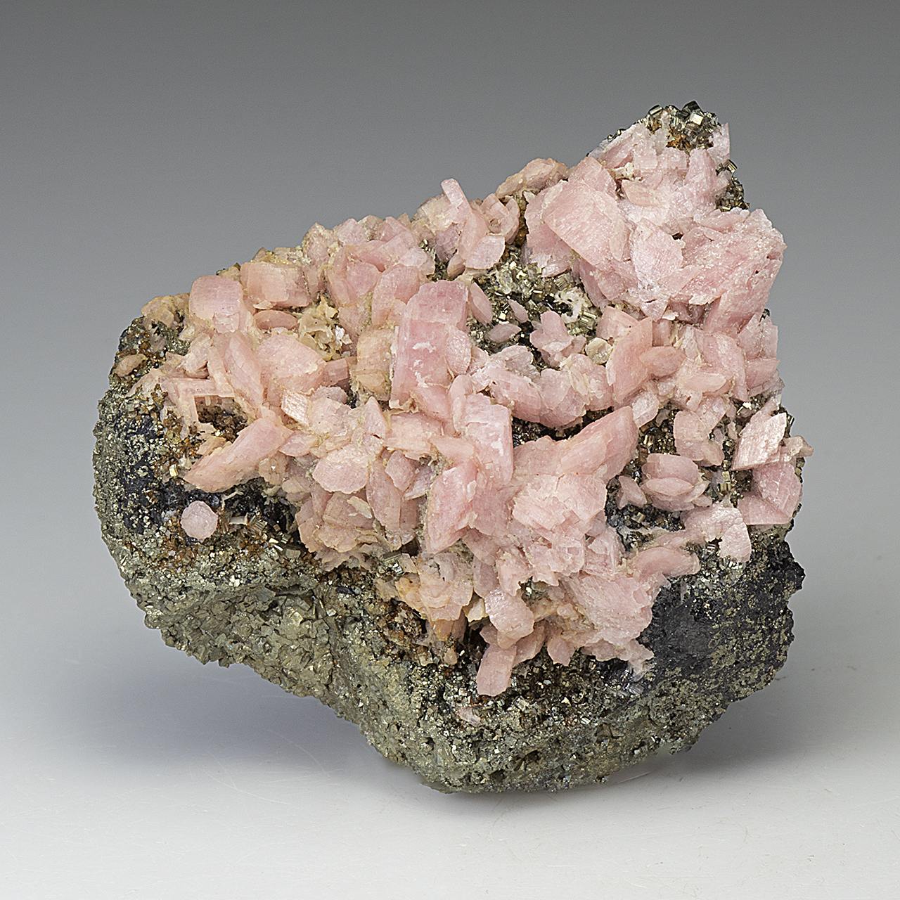 Pink Crystals Rhodochrosite with Particles of Pyrite. Natural Texture of  Mineral for Background Stock Image - Image of crystal, nugget: 131529665